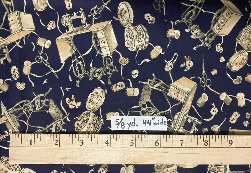 Sewing theme fabric – images: thread, button, scissors, etc- navy/cream – 5/8 yd
