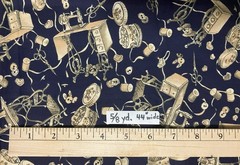Sewing theme fabric – images: thread, button, scissors, etc- navy/cream – 5/8 yd