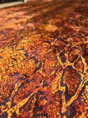 Fabric by the YARD orange, black and yellow snake skin ployester and elastane