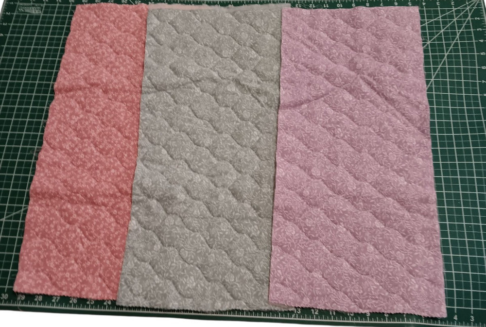 3 Pieces of Quilted Fabric Nylon Backed Pink Lavender Green .25 yd each x 25″